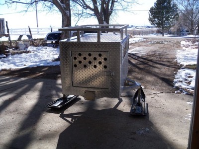 its 24 wide 22 tall and 40 long, to fit 4 dogs, 5 if you stuff them.